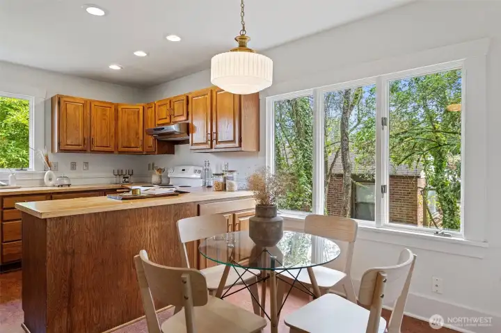 Spacious kitchen with nice layout that accommodates an informal dining room.