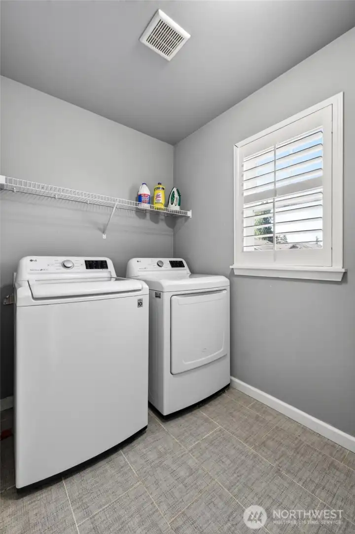 Utility room upstairs with tile flooring! Utility room upstairs with tile flooring!
