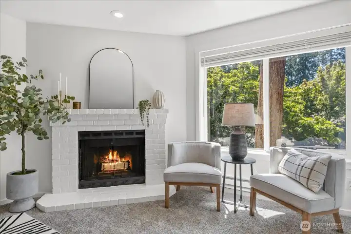 Cozy up to the real wood-burning fireplace in our cooler months. Cozy up to the real wood-burning fireplace in our cooler months.