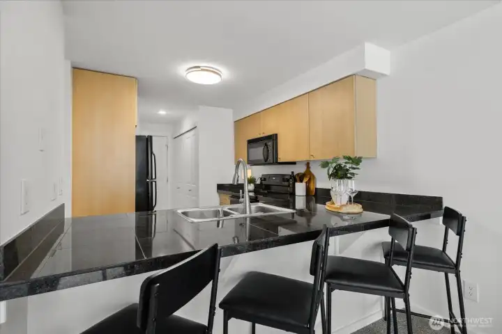 Convenient and ample counter-seating for your morning espresso or casual dining. Convenient and ample counter-seating for your morning espresso or casual dining.