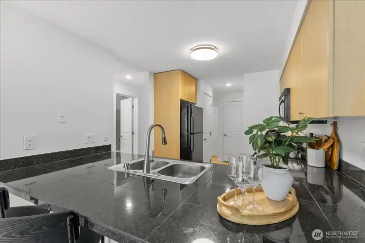 The chef gets to be part of the action with this open concept kitchen. The chef gets to be part of the action with this open concept kitchen.