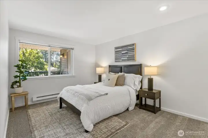 Bedroom #2 is also bright and cheery and overlooks the balcony. It has its own entrance to the shared hall bath Bedroom #2 is also bright and cheery and overlooks the balcony. It has its own entrance to the shared hall bath
