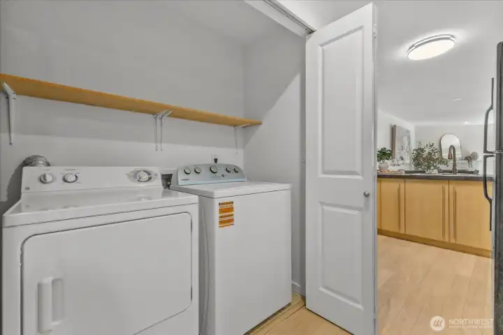 Full size new washer (2025) and dryer are conveniently located off of the kitchen. Full size new washer (2025) and dryer are conveniently located off of the kitchen.