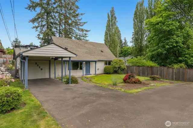 Get Your Foot in the Door in Lake Forest Park! Charming home on large lot w/lovely deck + deep & wide backyard! South-facing & bathed in natural light, this home boasts 2 beds on the main floor & 2 on the second story, offering many options: a bedroom for everyone, home offices, workout/yoga studios, art/music studios. A full bath & a 3/4 bath (one per floor) & an open flr plan that leads thru big sliders to a wonderful, generous deck to extend your living space. Roomy gar + carpot. Enjoy LFP LIVING: 5 min to I-5/lightrail = EZ commutes north & south, 5 min to LFP Town Center, Lake WA fun nearby. HURRY: Darling & functional home + lovely lot + sweet location = enticing opportunity! Deeded LFP Civic Club Eligibility w/beach & boat launch!!