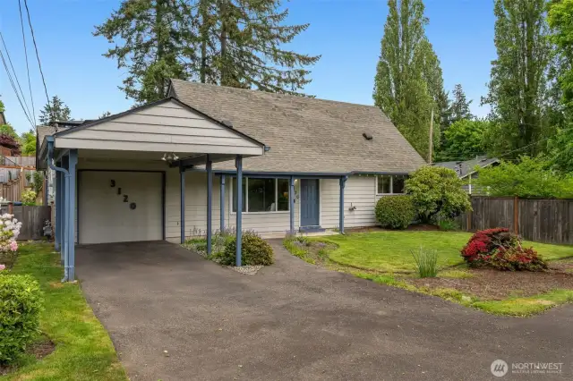 Lush green location, sweet neighborhood nook, a garage + carport + mutliple off-street parking spots.