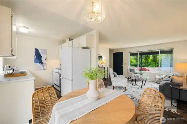 Lovely eating space and sliders that extend the flow of your living space and invite you to enjoy this amazing backyard!