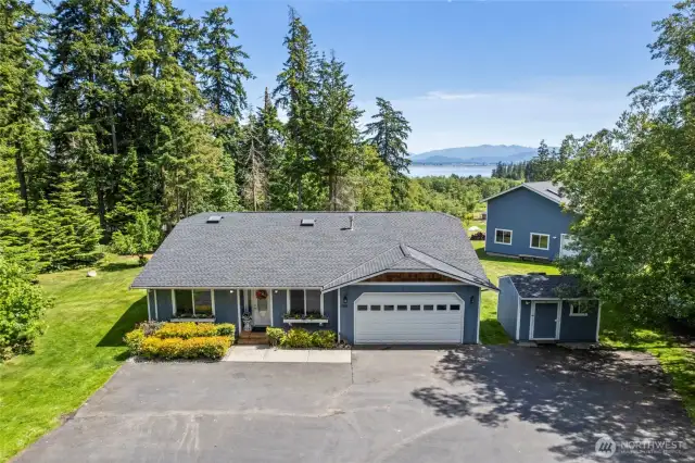 Acreage, shop, water view! What else could you need?