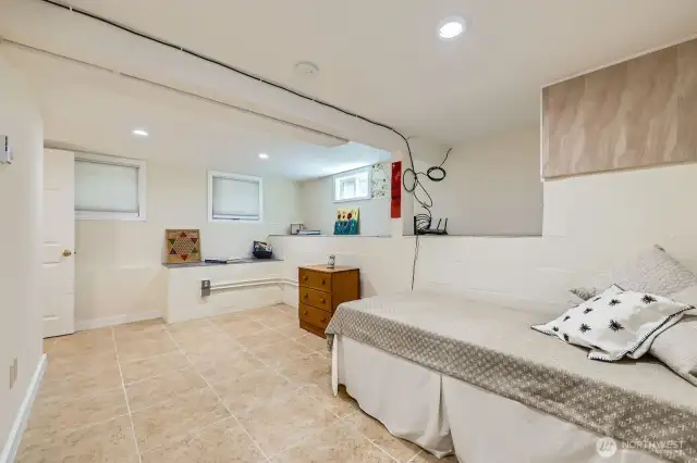 Plenty of space in this downstairs bedroom. Windows provide lots of natural light. Tucked away, this room is nice and private.