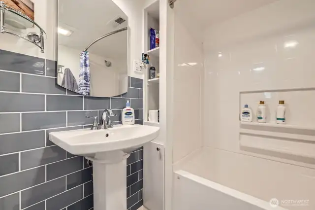Completely remodeled in 2023, this full bath downstairs is both beautiful and functional.