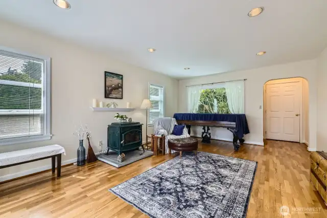 Gleaming hardwood floors bring a warm glow to this spacious living room. Pellet stove keeps you nice and toasty in the colder months.