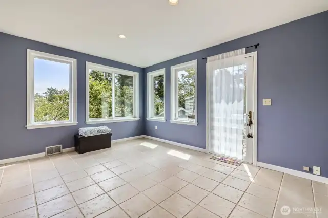 Most recently used as a Guest Room (closet currently has shelves which are easily removed), this Flex Room has so many possibilities! Formal Dining Room, Spacious Office, Sun-drenched Lounge...endless options. Door leads to extra large deck.