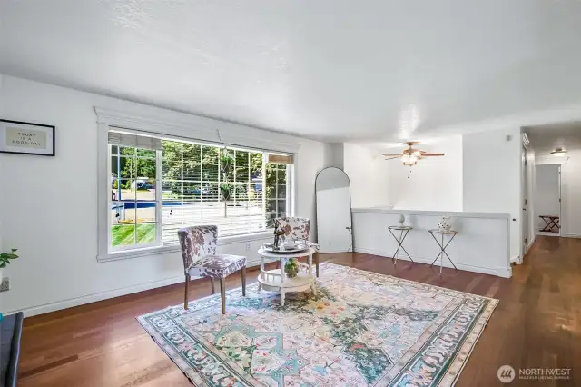 Generous Open Floor Plan as Living & Dining Area Flow Seamlessly into the Kitchen~Lightfilled Picture Window Looks over the Front Yard~
