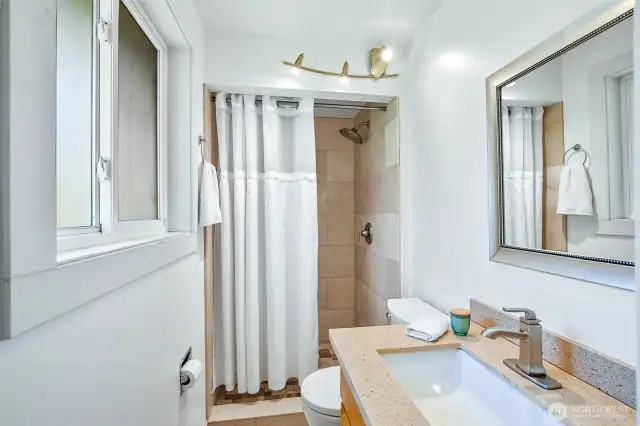 Quartz & Granite Finishes~Undermount Sink & Elevated Vanity~Step in Shower~Complete the Attached Three Quarter Primary Bath~