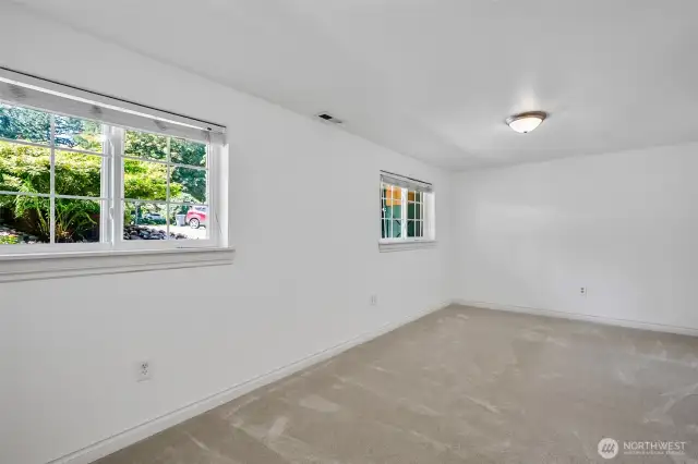 Front Facing Lower Level Bedroom also with New Wall to Wall Carpeting & Fresh Paint~ Bedroom Five is the Larger of the Two Bedrooms on this Level~