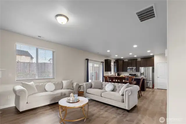Open Concept main level with beautiful wide plank gray engineered hardwood flooring