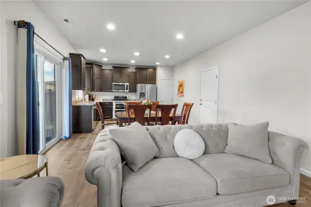 Open Concept main level with beautiful wide plank gray engineered hardwood flooring