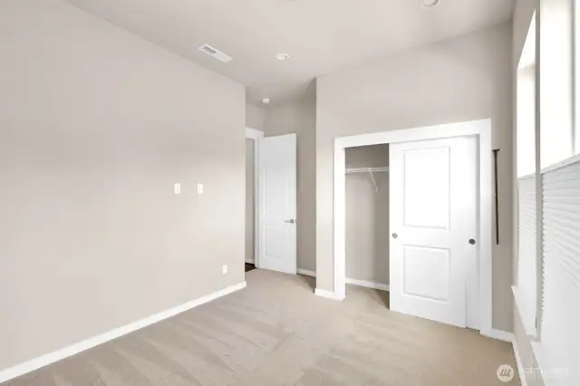 Flexible second bedroom—perfect for guests, hobbies, or a home office.