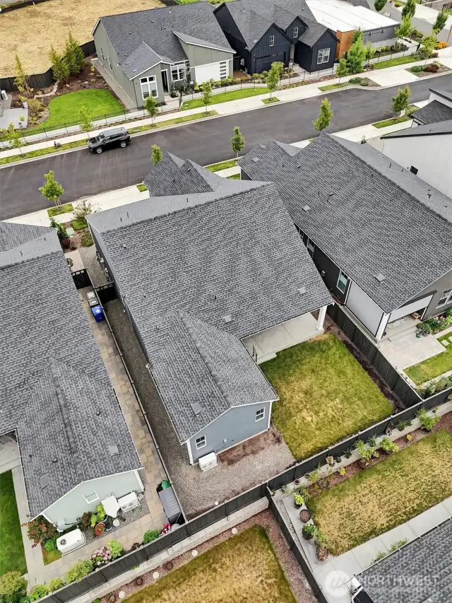 Low-maintenance backyard with room to relax or garden.