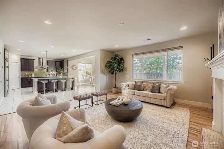 Living room connects to the kitchen and dining spaces.
