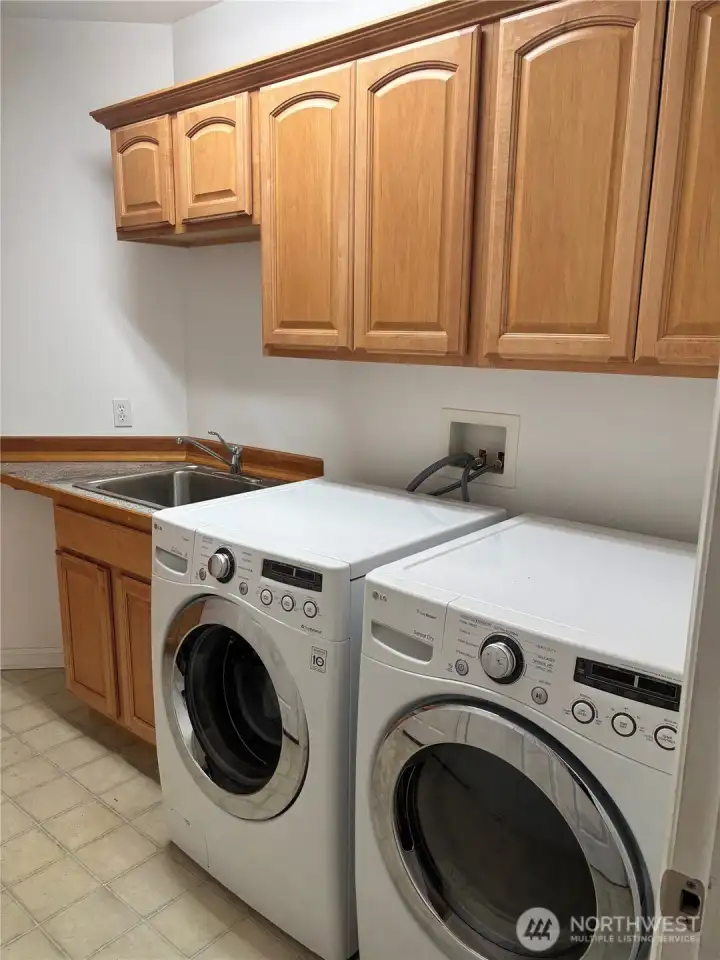Washer, dryer, sink area