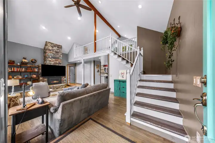 Stairs at the entry lead up to the Loft