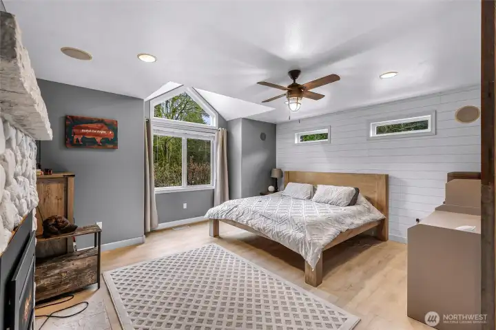 Primary Bedroom with Ceiling Fan and Fire Place