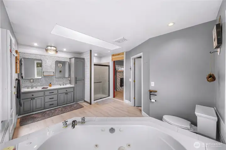 Priary Bath with a Jetted Tub and Shower