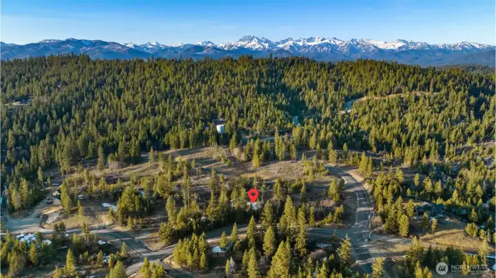 Lot 46 is left of the marker.  Lot 48 is right of the marker. Lot 47 is between them.  There are now homes being built on lots 46 and 48.