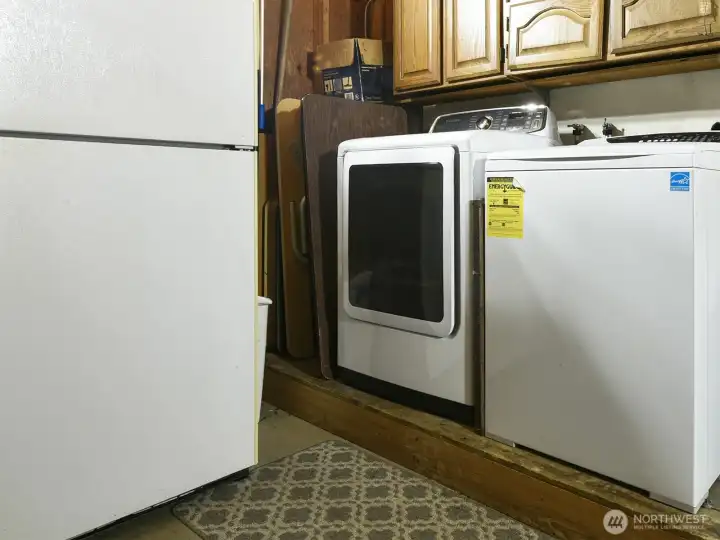 Washer dryer stay with home.  Cabinets too for storage.