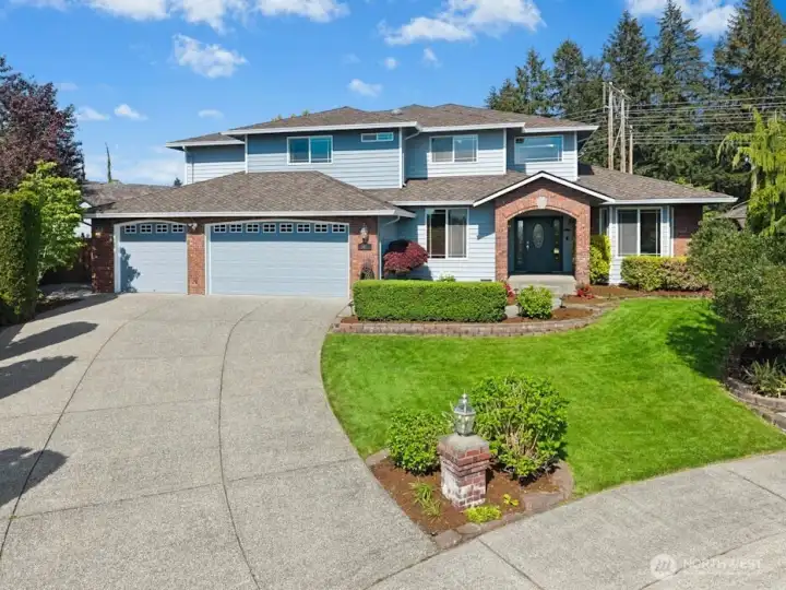 Stunning first-time-on-market Reykdal Craftsman in sought-after Apple Tree.