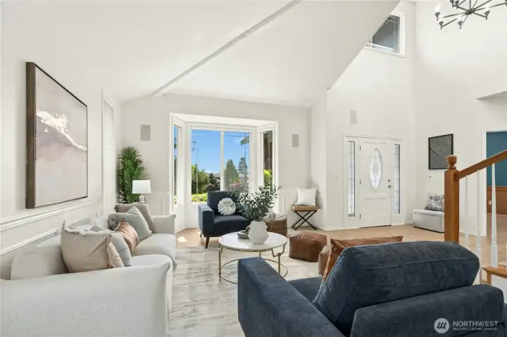 Elegant formal living room filled with natural light.