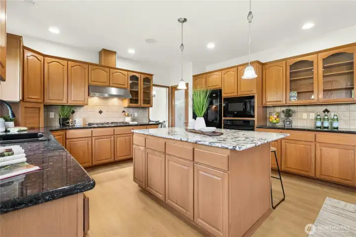 Extensive cabinetry offers incredible kitchen storage