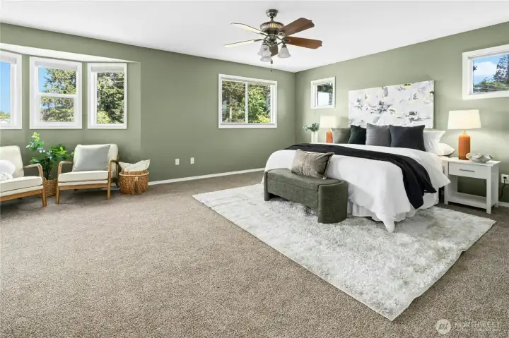 Oversized primary suite offers a peaceful retreat.