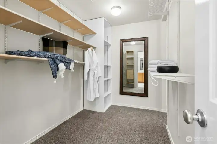 Enormous walk-in closet with exceptional storage space.