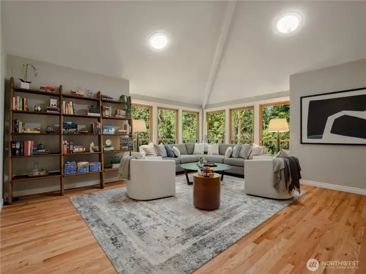 Vaulted ceilings and the multitude of windows provide abundant natural light.