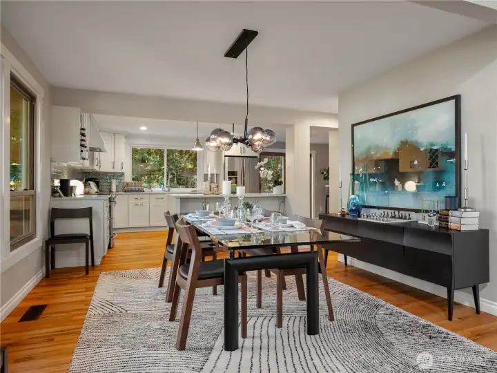 The dining room has ample room to accommodate a table for 12. And, there is space in the kitchen for an informal dining table and chairs.