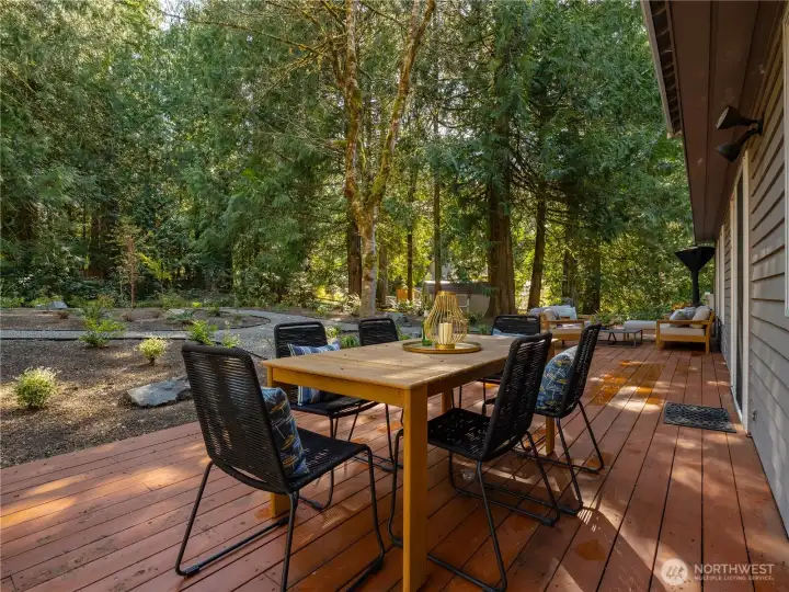 On the western part of the property, a lush woodland area, nearly a quarter acre, adds an extraordinary sense of seclusion & natural beauty rarely found in a residential setting. The easily furnish an outdoor living and dining space.