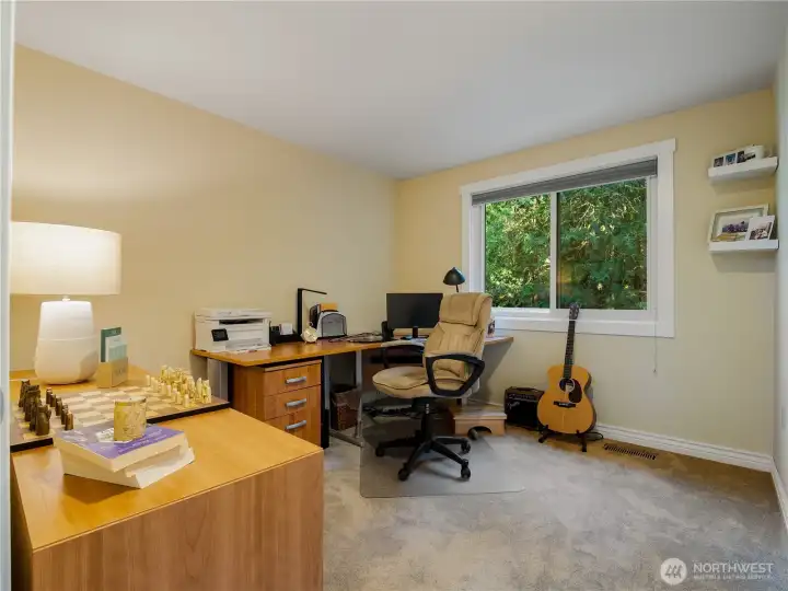 Second of the three upstairs bedrooms, currently used as a home office.