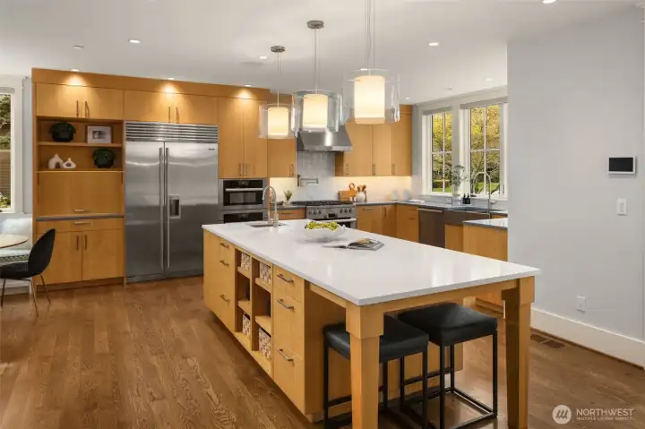 Culinary Showcase Kitchen with Custom crafted solid Anigre wood cabinetry.