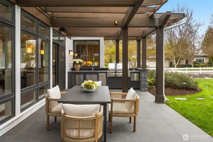 Outdoor Entertaining with Translucent Cover and Built-In Kitchen