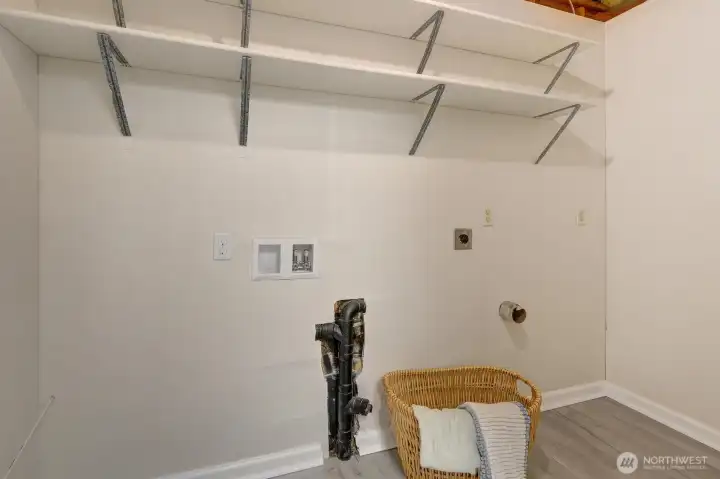 Utility room could be used as extra storage room if buyer chooses to use laundry hook-up in garage.