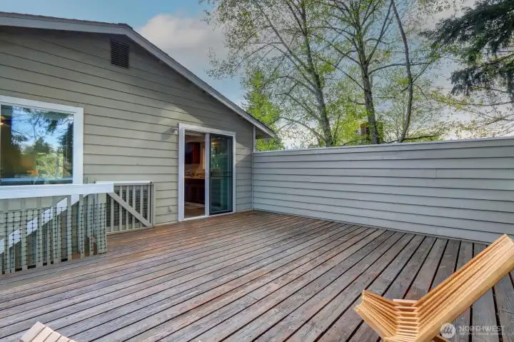 Note the nice privacy wall and the steps to access backyard.