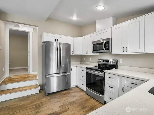These steps lead to the 3/4 bath/laundry and bedroom #1