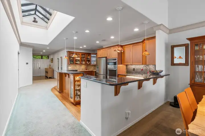 From the moment you step into this penthouse residence, you’re welcomed by expansive skylights—an exclusive feature of top-floor living—that fill the home with incredible natural light. The airy, open layout feels bright and inviting throughout, while sweeping water views from nearly every room create a stunning backdrop for everyday living.
