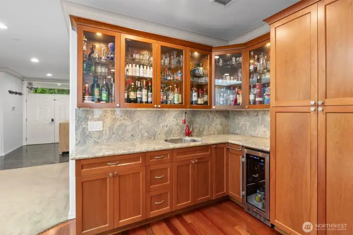 The built-in wine fridge and wet bar provide an almost butler's pantry feel to this part of the kitchen!