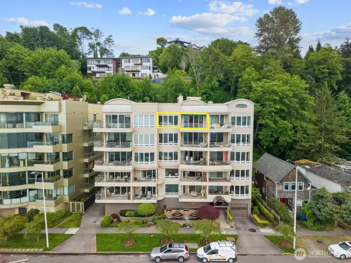 The yellow outline highlights this exceptional top-floor penthouse residence, featuring expansive skylights that fill the home with natural light and the added comfort of central air conditioning—a rare luxury for condo living in Seattle.