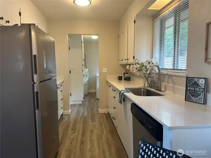 Unit 1010 Kitchen to Laundry Room