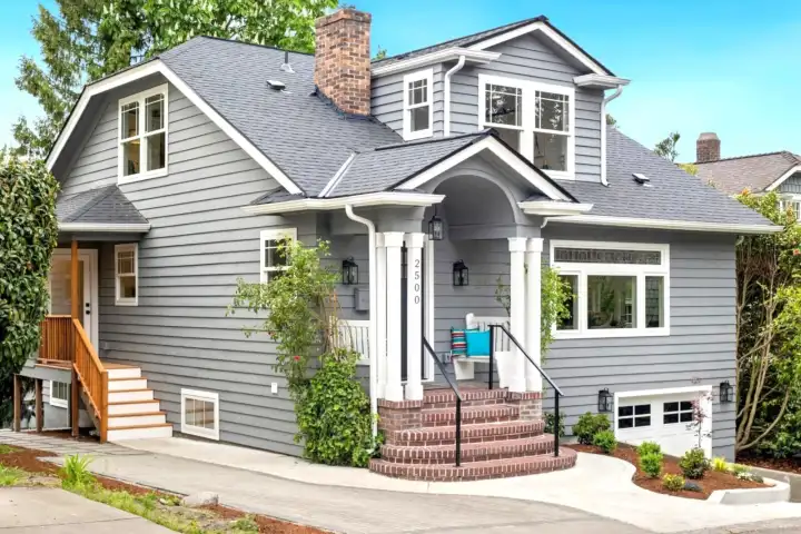 1 car garage with 1 dedicated parking pad and a driveway!