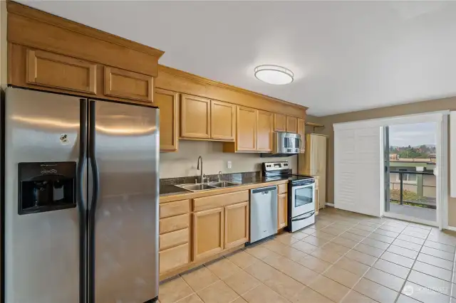 Kitchen with stainless appliances and granite counter