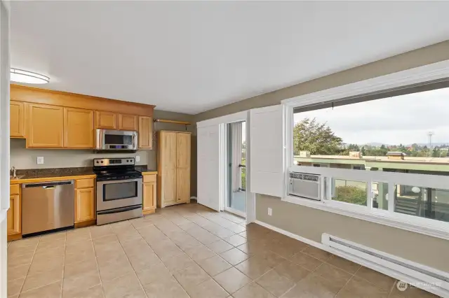 Kitchen and slider to deck from living room